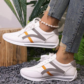 Cushioned White Striped Sneakers for Women – Stylish & Comfortable Design 0