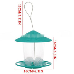 Hanging bird feeder with automatic seed dispenser