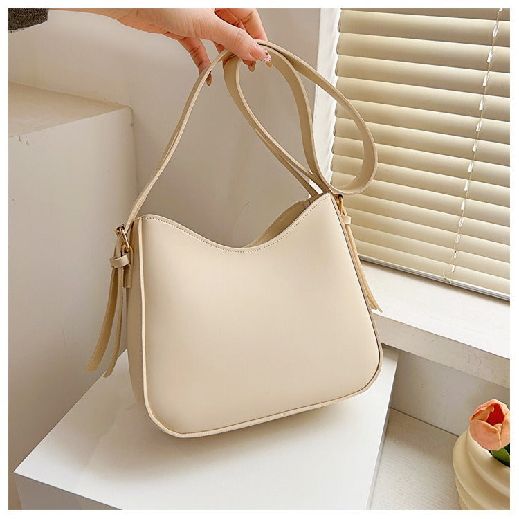 Sac bandoulière minimaliste pour femmes en cuir vegan élégant
