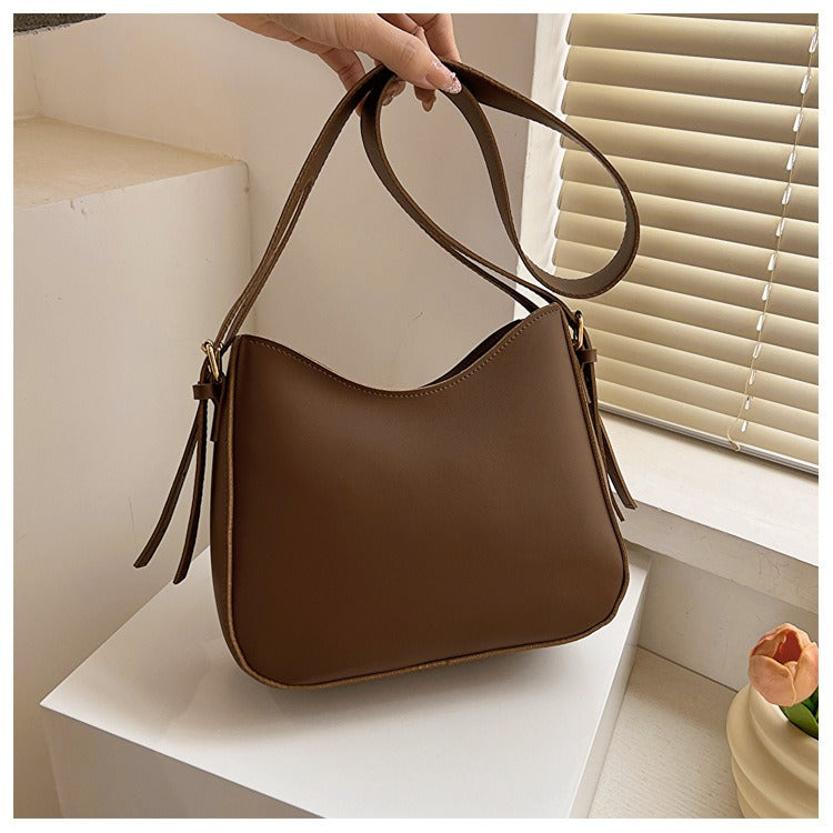 Sac bandoulière minimaliste pour femmes en cuir vegan élégant