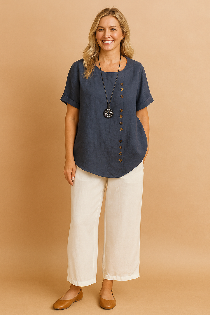 Liva | Asymmetrical blouse with decorative clasp 3