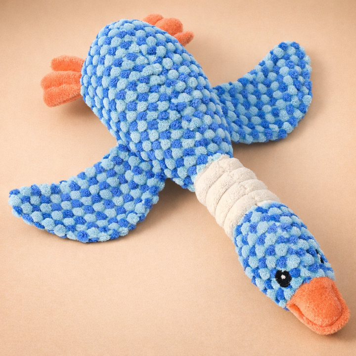 Plush dog chew toy with squeaking sound