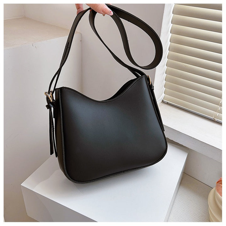 Sac bandoulière minimaliste pour femmes en cuir vegan élégant