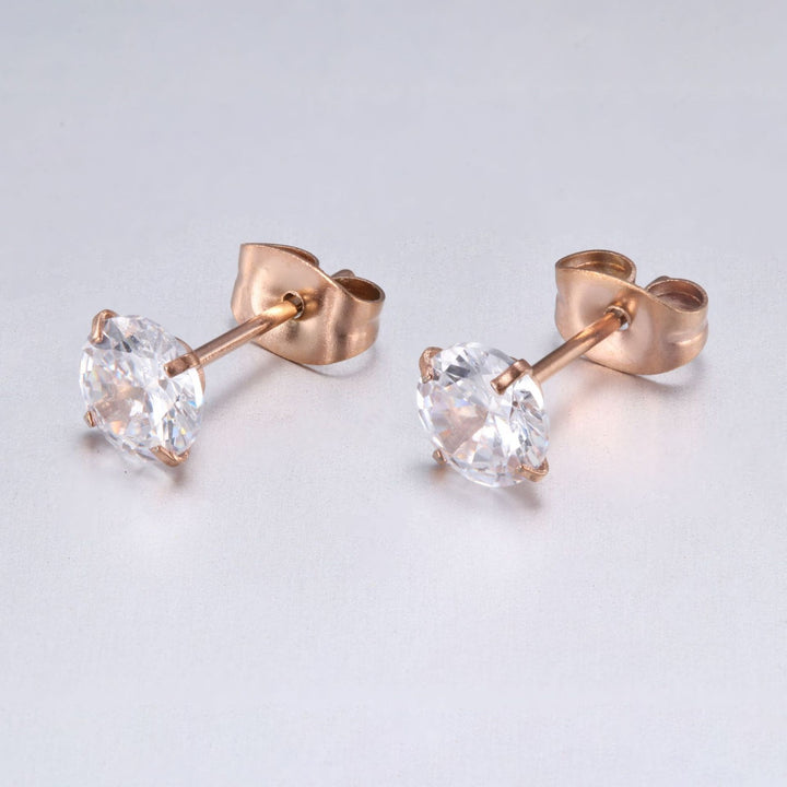 Boucles d'oreilles élégantes en or avec pierres étincelantes – Parfaites pour toute occasion