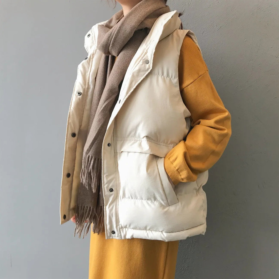 Women's quilted winter vest with pockets and snaps