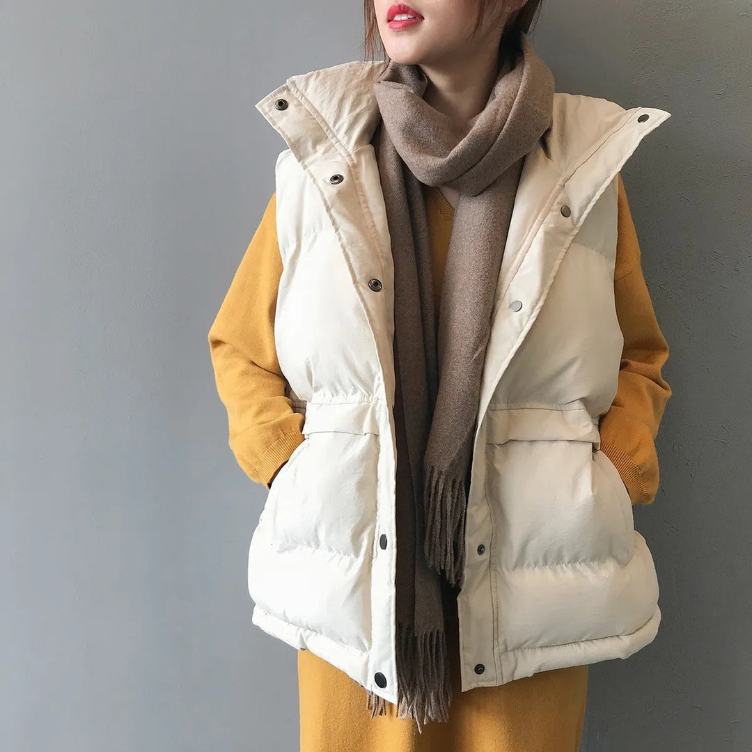Women's quilted winter vest with pockets and snaps